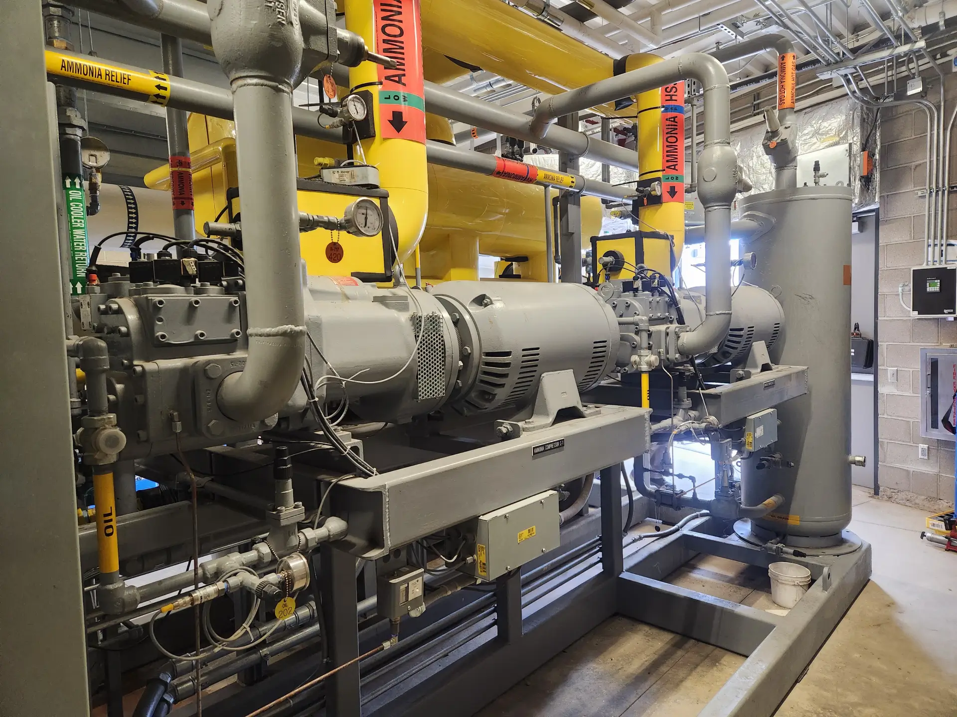 A large industrial machine with pipes and valves.